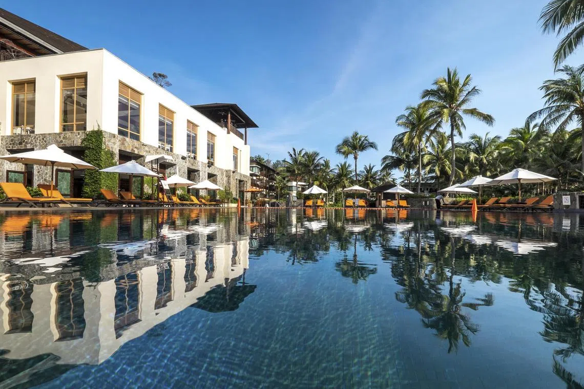 The Singapore-listed firm is seeking to acquire from 20 per cent to 30 per cent in the hotelier for several hundred million euros, the sources said.