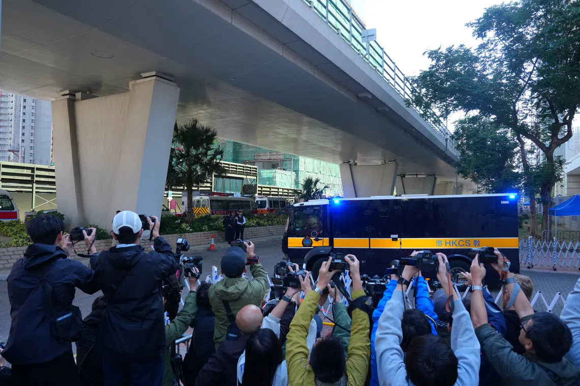 A prison van believed to be carrying Jimmy Lai leaving the West Kowloon Magistrates' Courts building in Hong Kong on Dec 15.