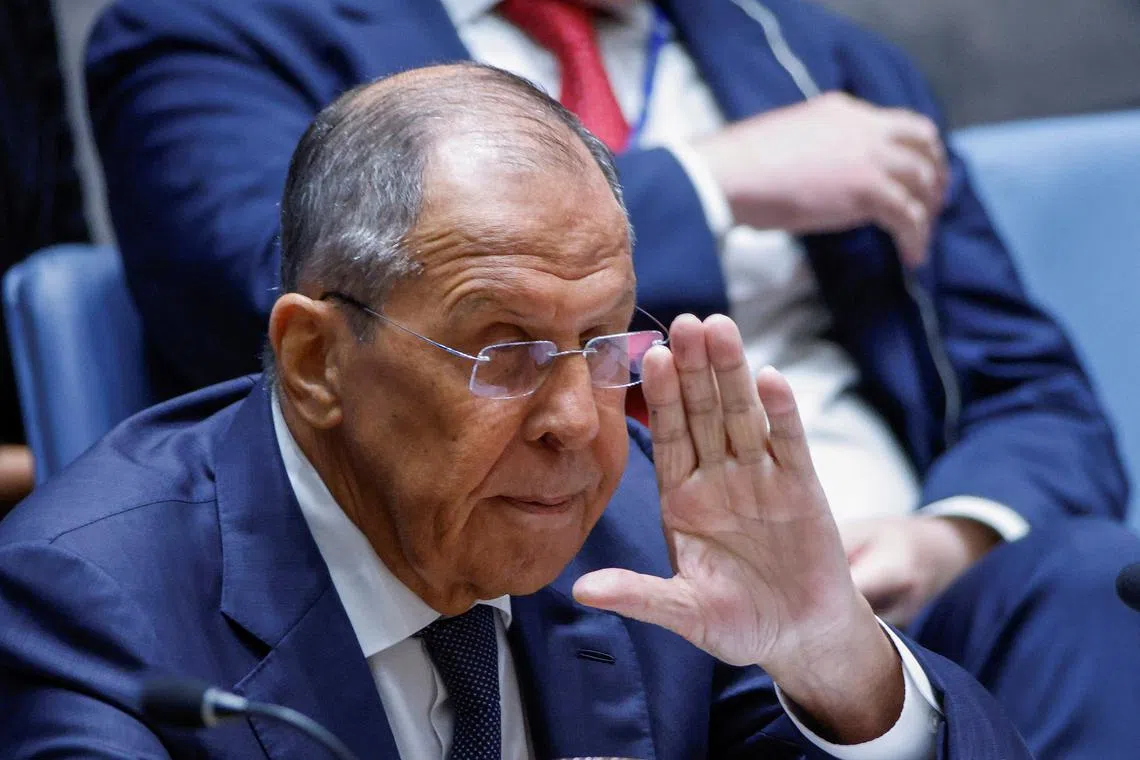 Russian Foreign Minister Sergei Lavrov greets delegates as he chairs a meeting of the United Nations Security Council at the United Nations Headquarters in New York City, U.S., July 16, 2024. REUTERS/Eduardo Munoz