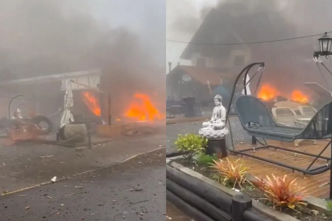 The plane reportedly first struck the chimney of a building, then the second floor of a house, before crashing into a furniture store.