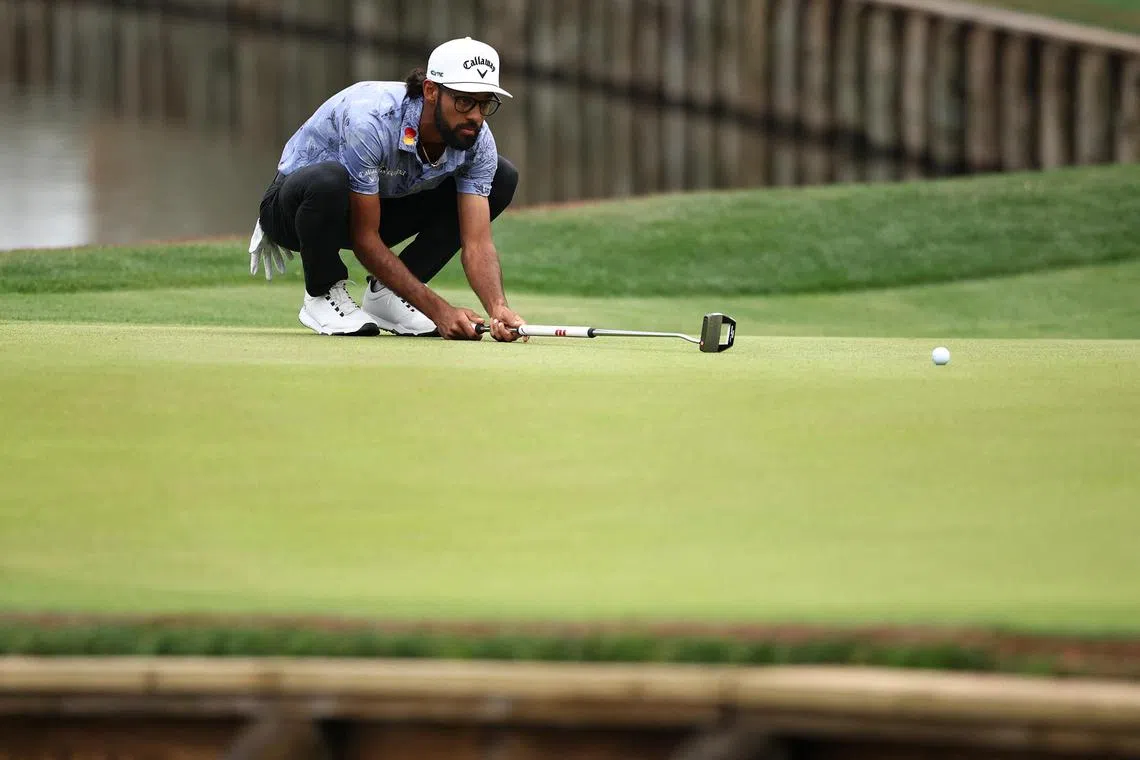 Akshay Bhatia of the United States lines up a putt on the 16th green during the final round of The Players Championship on the Stadium Course at TPC Sawgrass on March 16, 2025 in Ponte Vedra Beach, Florida.  