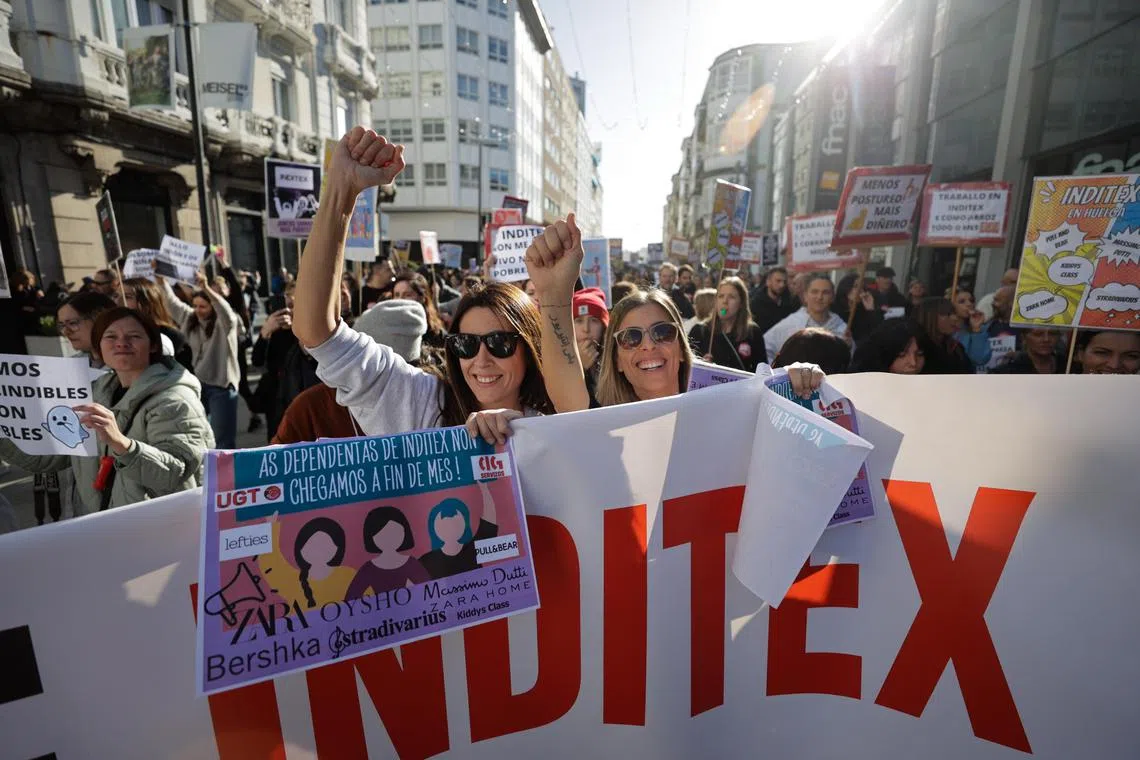 Workers of different shops of Inditex, owner of Zara, Pull and Bear, Bershka, Stradivarius, Massimo Dutti and more protest in A Coruña, Spain, demanding higher salaries.