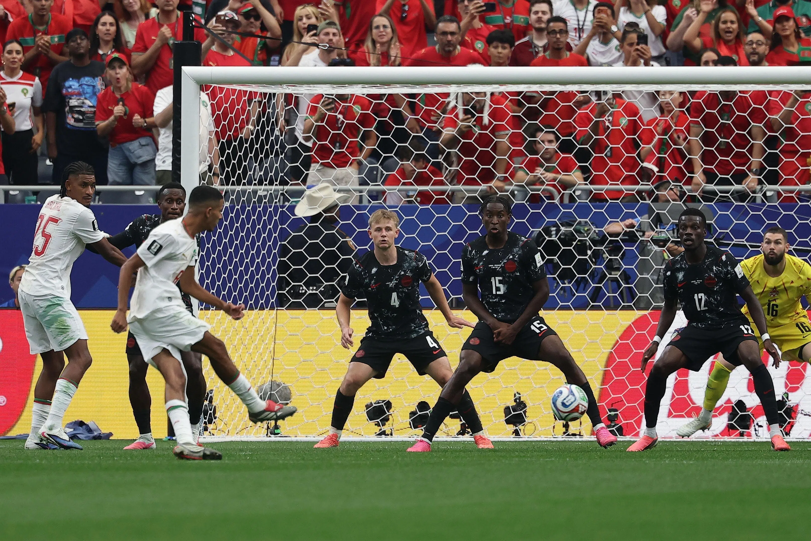 epa13086965 Azzedine Ounahi (2-L) of Morocco scores the 1-0 lead during the FIFA World Cup 2026 Round of 16 match Canada against Morocco, in Houston, USA, 04 July 2026.  EPA/CHRISTOPHER NEUNDORF