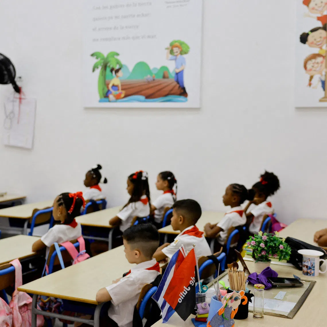 FILE PHOTO: Students attend class during the first day of the 2026-2027 school year amid a severe economic crisis that has prompted authorities to allow flexibility in schedules, attendance and school uniform requirements, in Havana, Cuba, September 1, 2026 REUTERS/Norlys Perez/File Photo