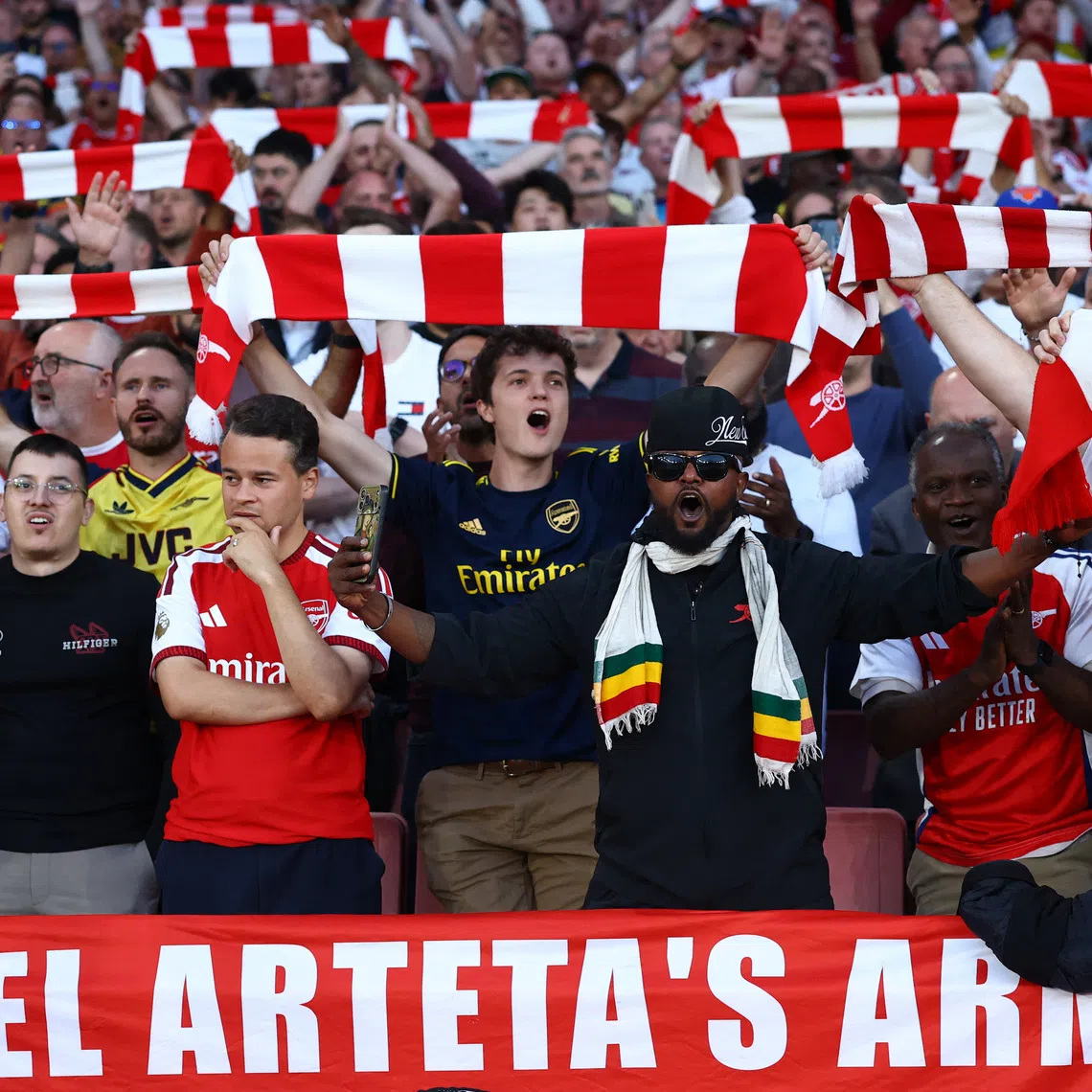 Soccer Football - Premier League - Arsenal v Coventry City - Emirates Stadium, London, Britain - August 21, 2026 Arsenal fans react inside the stadium before the match Action Images via Reuters/Peter Cziborra
