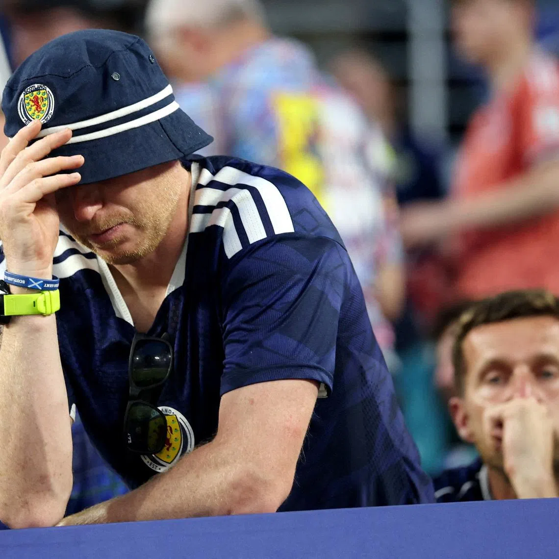 Soccer Football - FIFA World Cup 2026 - Group C - Scotland v Brazil - Miami Stadium, Miami Gardens, Florida, U.S. - June 24, 2026 Scotland fans look dejected at the end of the match REUTERS/Paul Childs