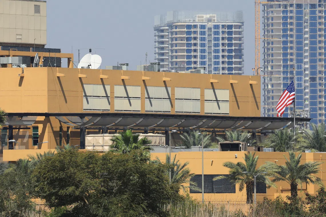 The US flag flying at the American embassy in Baghdad, Iraq, on March 17, after the building was targeted with drone and rocket attacks amid the US-Israel war on Iran.