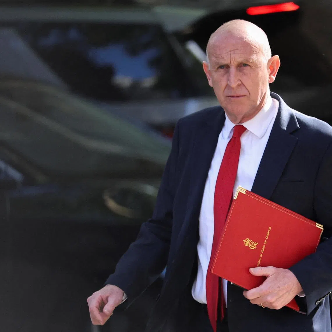 British Defence Secretary John Healey walks on Downing Street, to attend a cabinet meeting, the day before the State Opening of Parliament, in London, Britain, May 12, 2026. REUTERS/Toby Melville