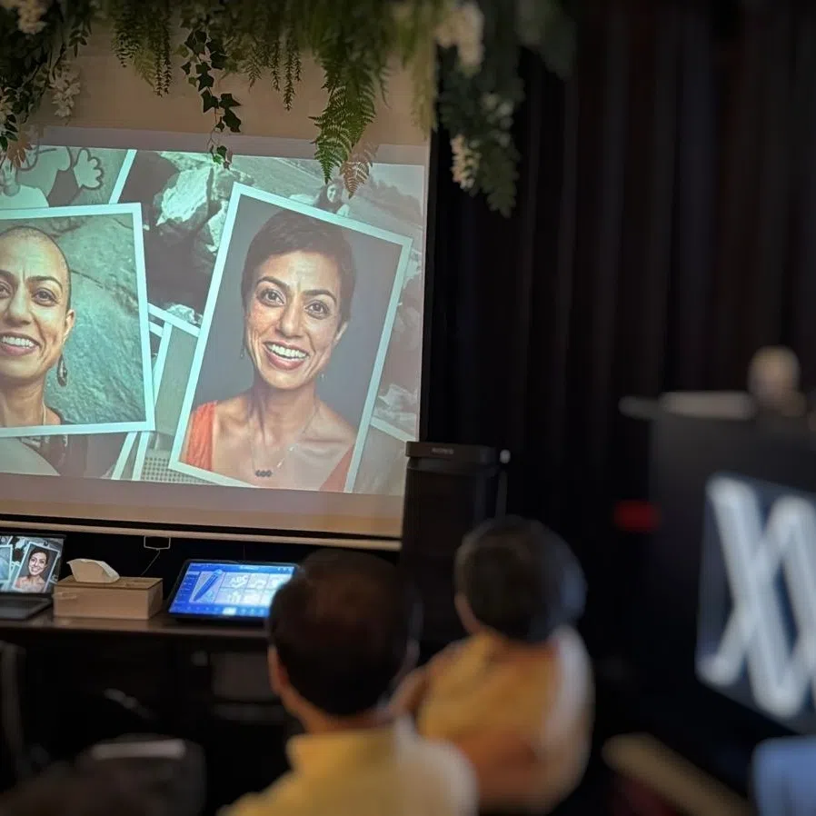 A video montage of photographs from the writer’s life screened during her birthday party.