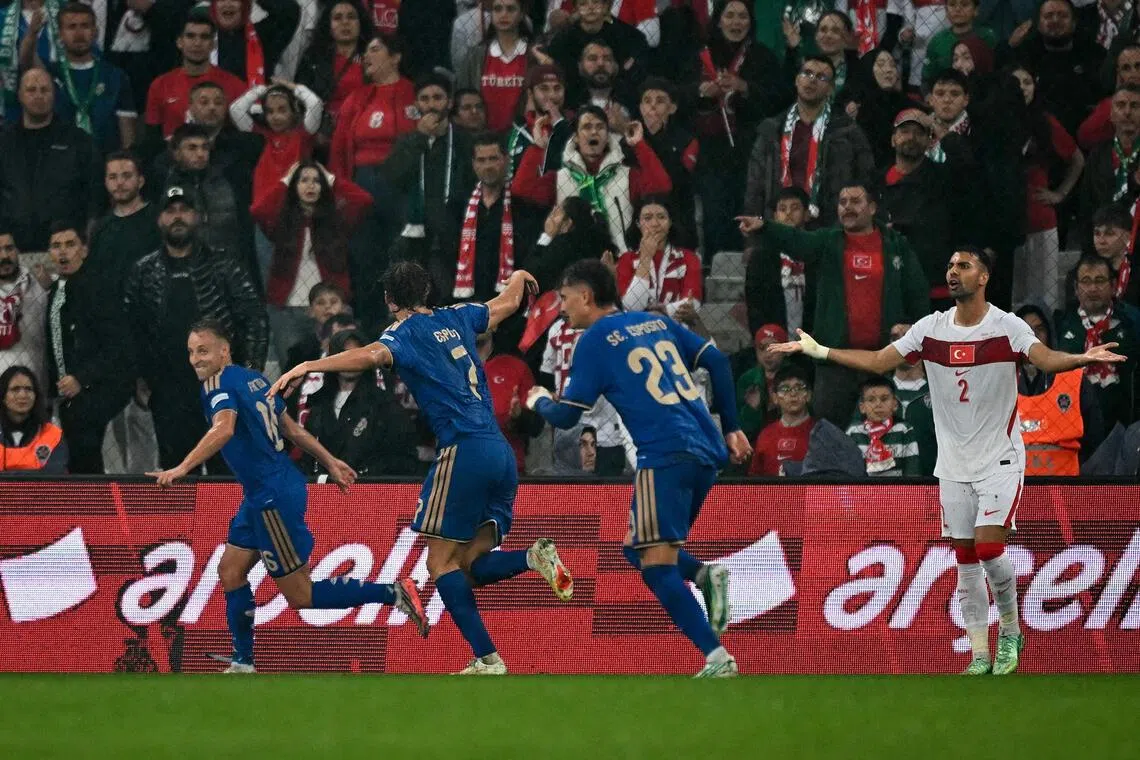Italy’s Davide Frattesi celebrating after scoring his team’s second goal during their 4-1 Nations League win over Turkey on Sept 28.