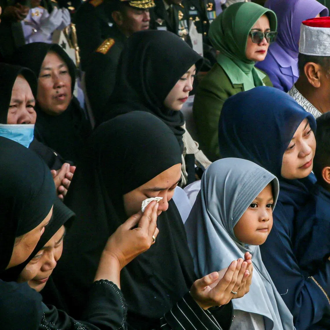 Relatives of Mr Zulmi Aditya Iskandar, a UNIFIL peacekeeper killed in Lebanon, attending his funeral at the Cikutra Heroes Cemetery in Bandung, West Java, Indonesia, on April 5.