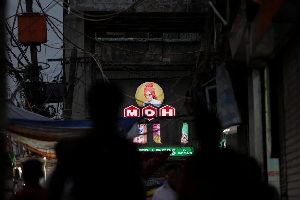 FILE PHOTO: A view of the logo of MDH, an Indian spice manufacturing company, on a shop in the old quarters of Delhi, India, May 3, 2024. REUTERS/Anushree Fadnavis/File Photo