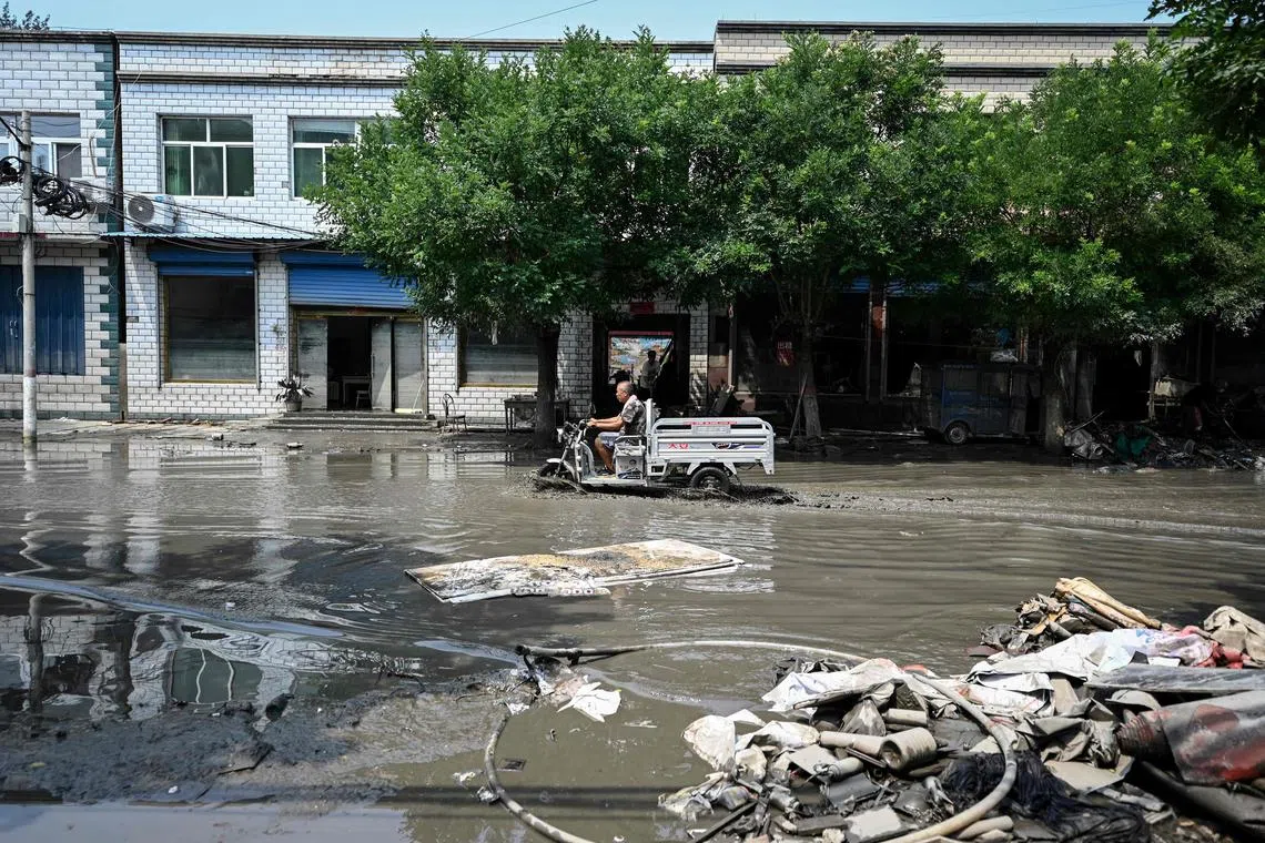 Thousands of homes and livelihoods were damaged when Zhuozhou bore the brunt of the floods that swept through Hebei province.
