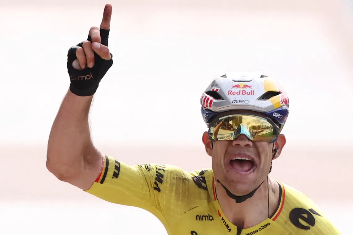 Cycling - Paris-Roubaix - Paris, France - April 12, 2026 Team Visma | Lease a Bike's Wout van Aert celebrates after crossing the finish line to win the 2026 Paris-Roubaix REUTERS/Christian Hartmann