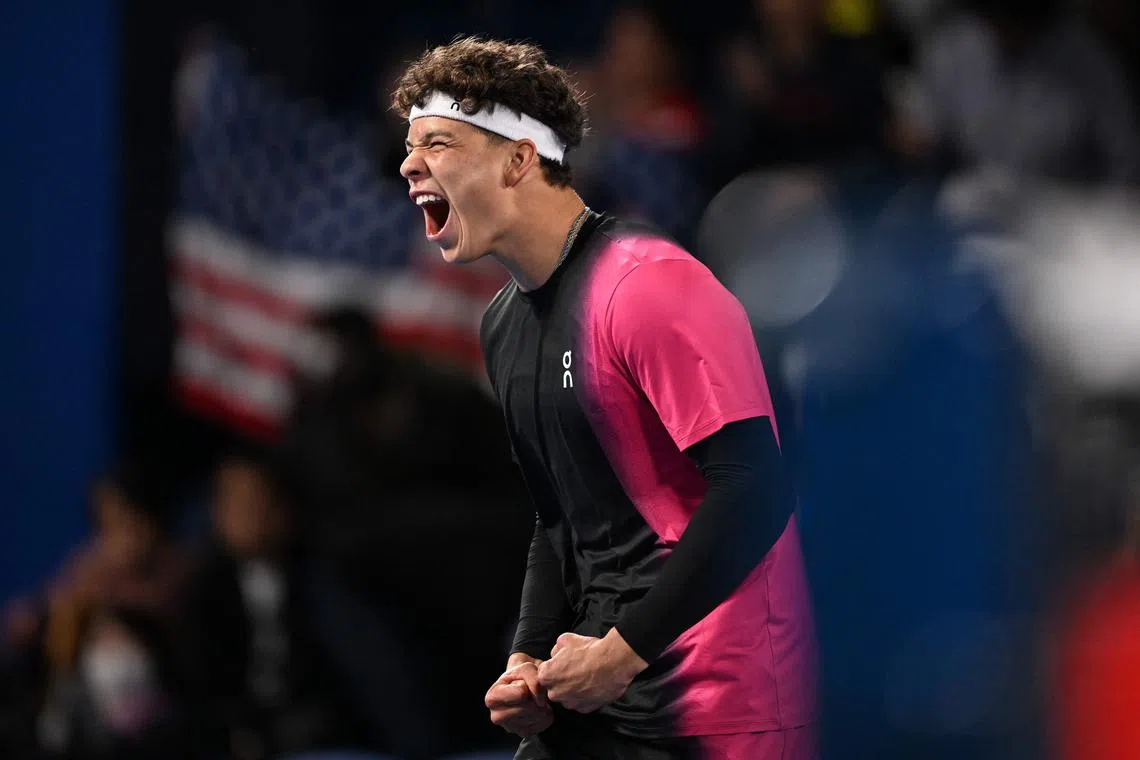 Ben Shelton celebrating his victory over Russia’s Aslan Karatsev after their men's singles final at the Japan Open.