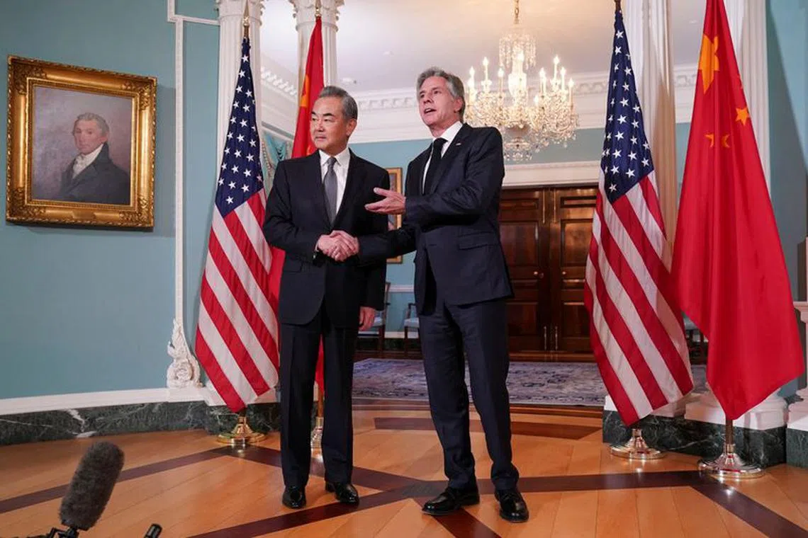U.S. Secretary of State Antony Blinken shakes hands with Chinese Foreign Minister Wang Yi as they meet at the State Department in Washington, U.S., October 26, 2023. REUTERS/Sarah Silbiger/ File Photo