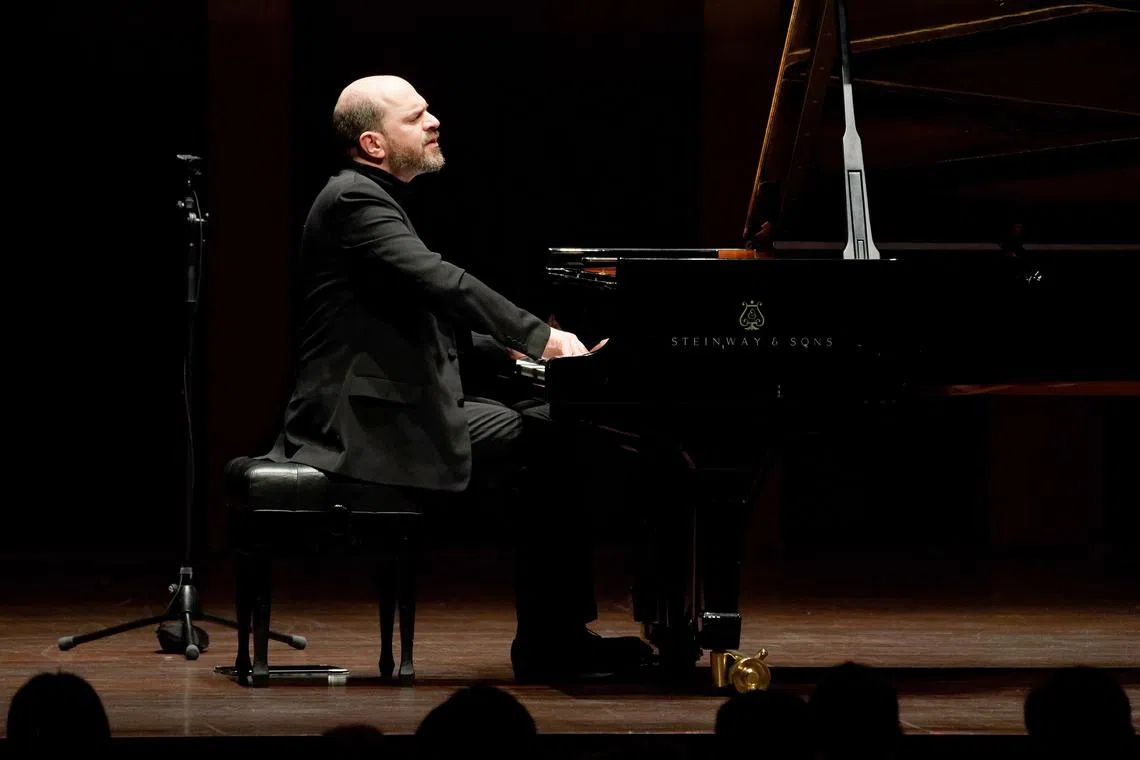 tlkirill28 - Pianist Kirill Gerstein held a recital at the Victoria Concert Hall on June 28. 

credit and copyright Ung Ruey Loon. 
For Life float