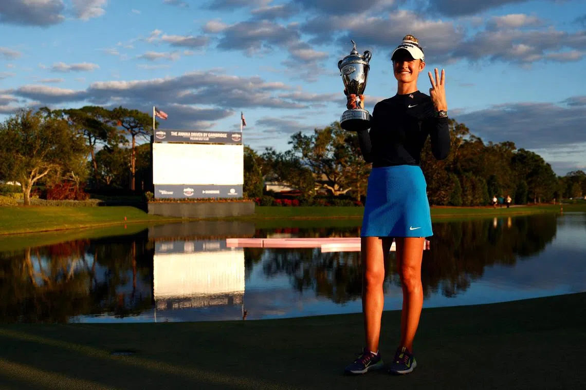 Third-time champion Nelly Korda of the United States posing with the winner's trophy after winning The Annika at Pelican Golf Club on Nov 17 in Belleair, Florida.