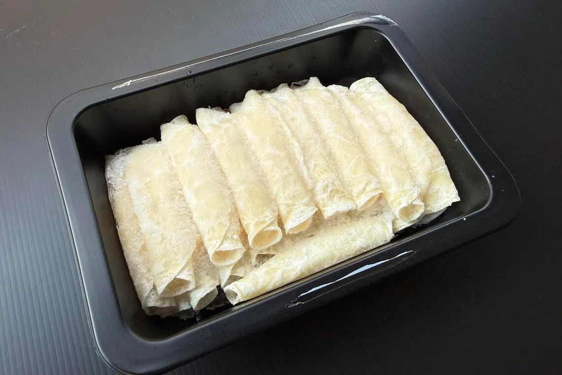 Rolinhos de vieiras do mercado de frutos do mar Songfish.