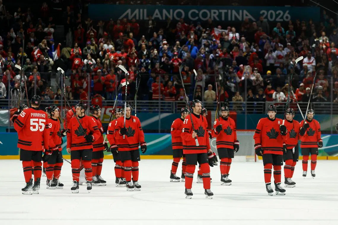 Milano Cortina 2026 Olympics - Ice Hockey - Men's Preliminary Round - Group A - Canada vs France - Milano Santagiulia Ice Hockey Arena, Milan, Italy - February 15, 2026. Canada players celebrate after the match IMAGN IMAGES via REUTERS/Geoff Burke