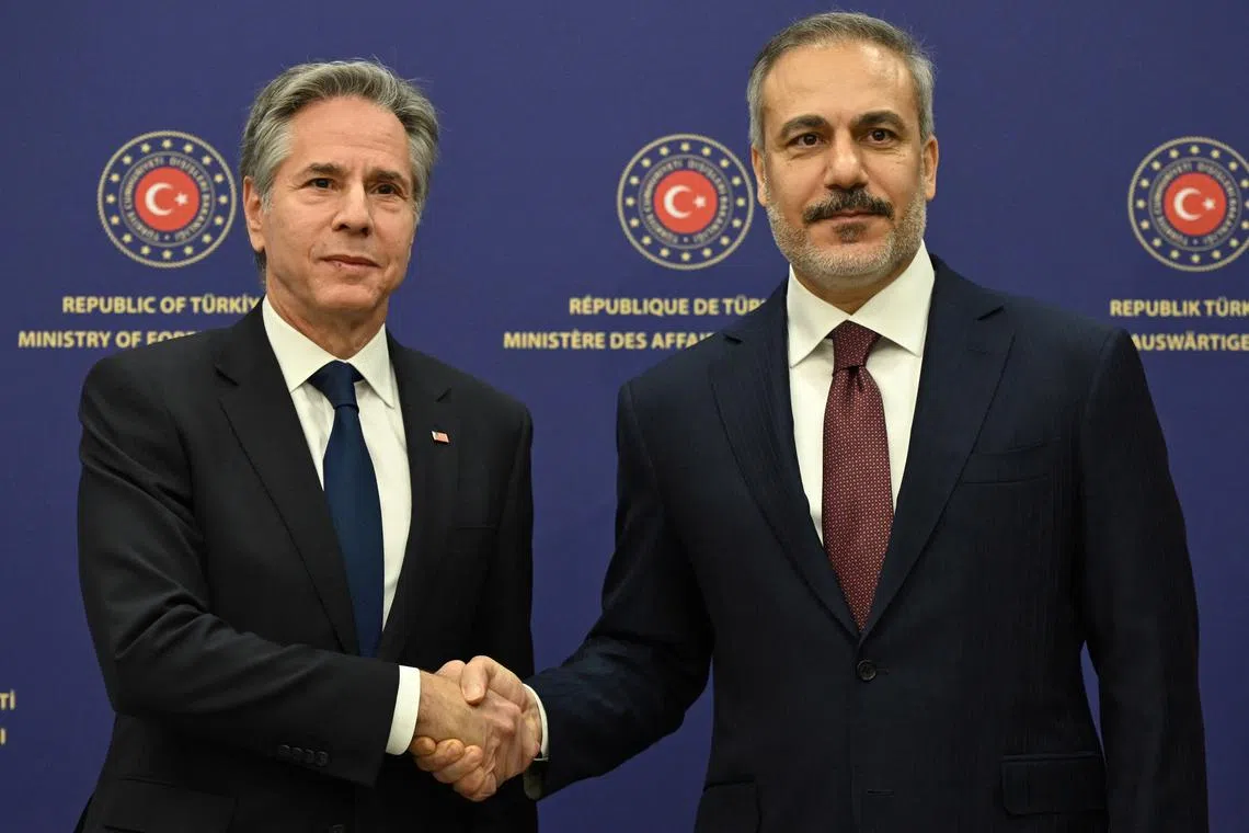 US Secretary of State Antony Blinken shakes the hand of Turkish Foreign Minister Hakan Fidan after a joint press conference at the Ministry headquarters in the Turkish capital Ankara on December 13, 2024. ANDREW CABALLERO-REYNOLDS/Pool via REUTERS