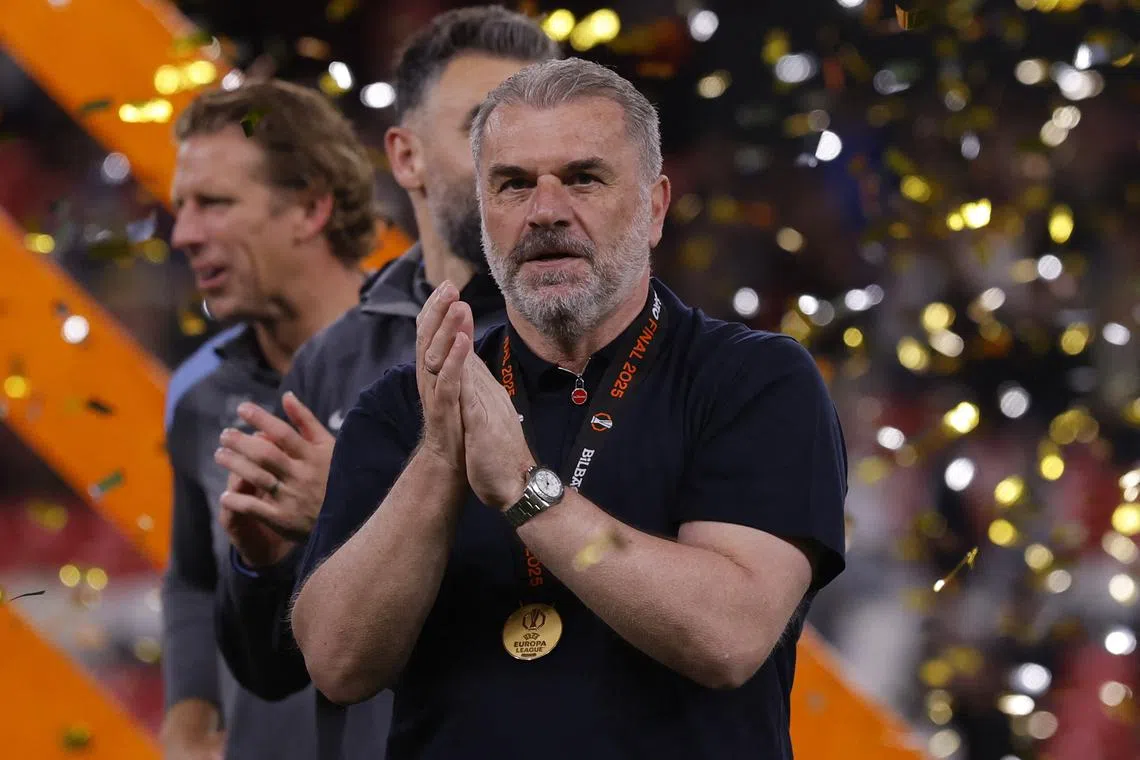 FILE PHOTO: Soccer Football - Europa League - Final - Tottenham Hotspur v Manchester United - San Mames, Bilbao, Spain - May 21, 2025 Tottenham Hotspur manager Ange Postecoglou celebrates after winning the Europa League Final REUTERS/Andrew Couldridge