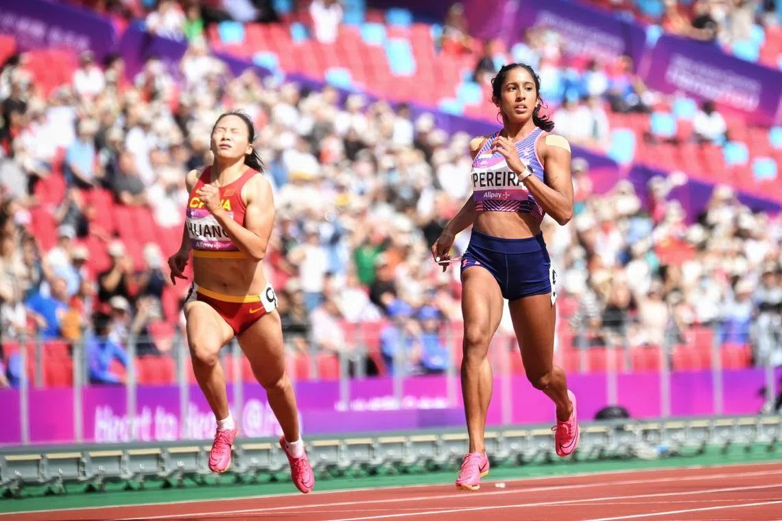 Shanti Pereira (right) topped the women's 200m heats at the Asian Games in 23.12 seconds.