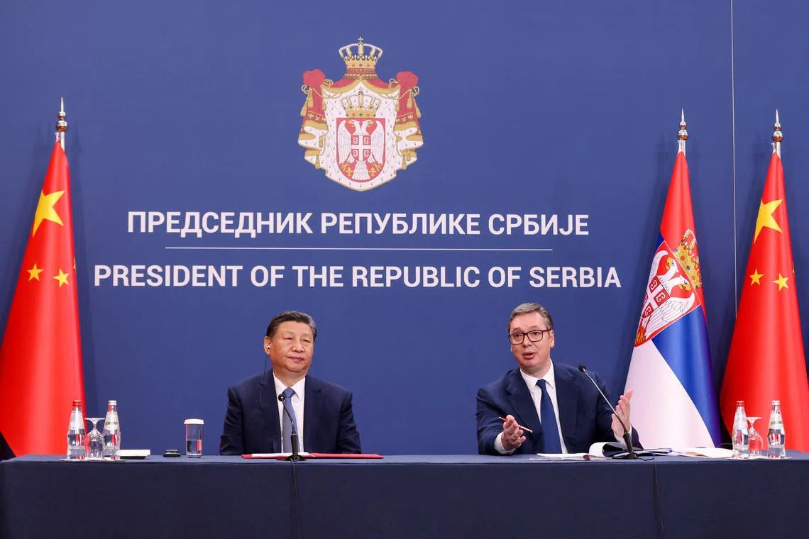 FILE PHOTO: Serbian President Aleksandar Vucic speaks next to Chinese President Xi Jinping on the day of their meeting, as part of the Chinese president's two-day state visit in Belgrade, Serbia, May 8, 2024. REUTERS/Zorana Jevtic/File Photo