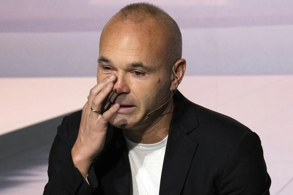 Spanish player Andres Iniesta announcing his retirement from professional football during the press conference held in Barcelona on Oct 8.