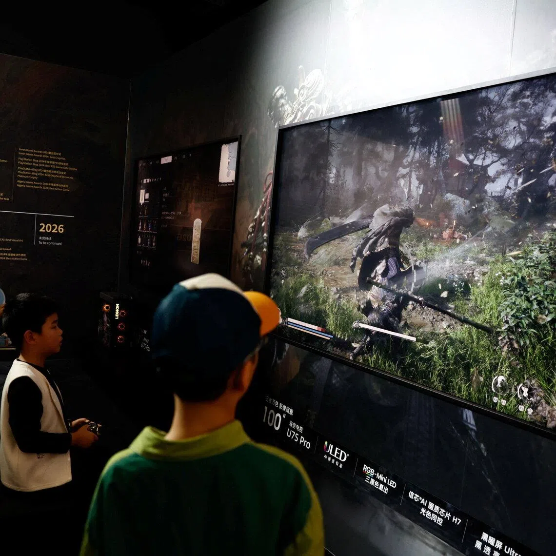Visitors play Black Myth: Wukong at the World Internet Conference in Wuzhen town, Zhejiang province, China.