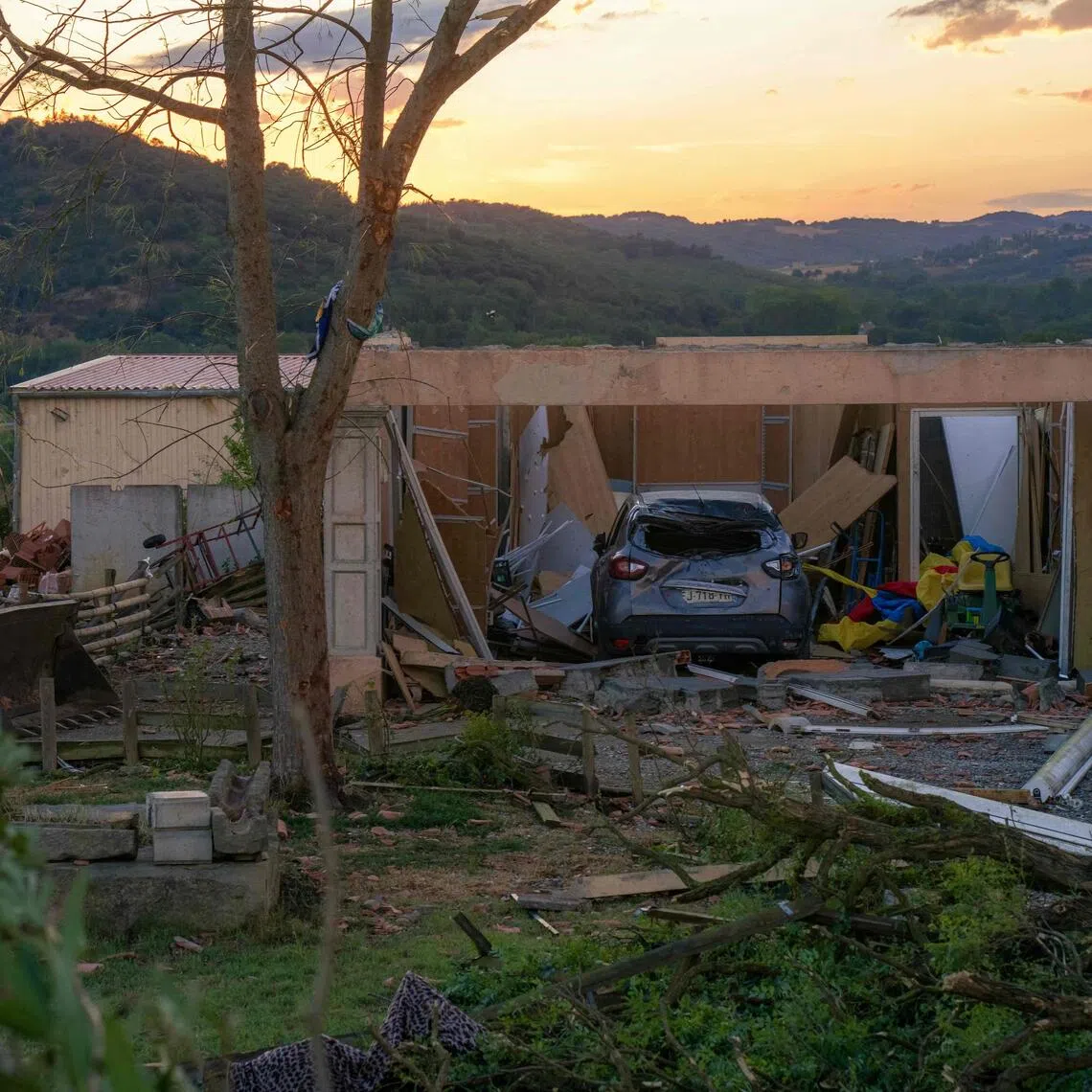 Damaged houses after a tornado struck Pomas in south-western France, on Aug 24.