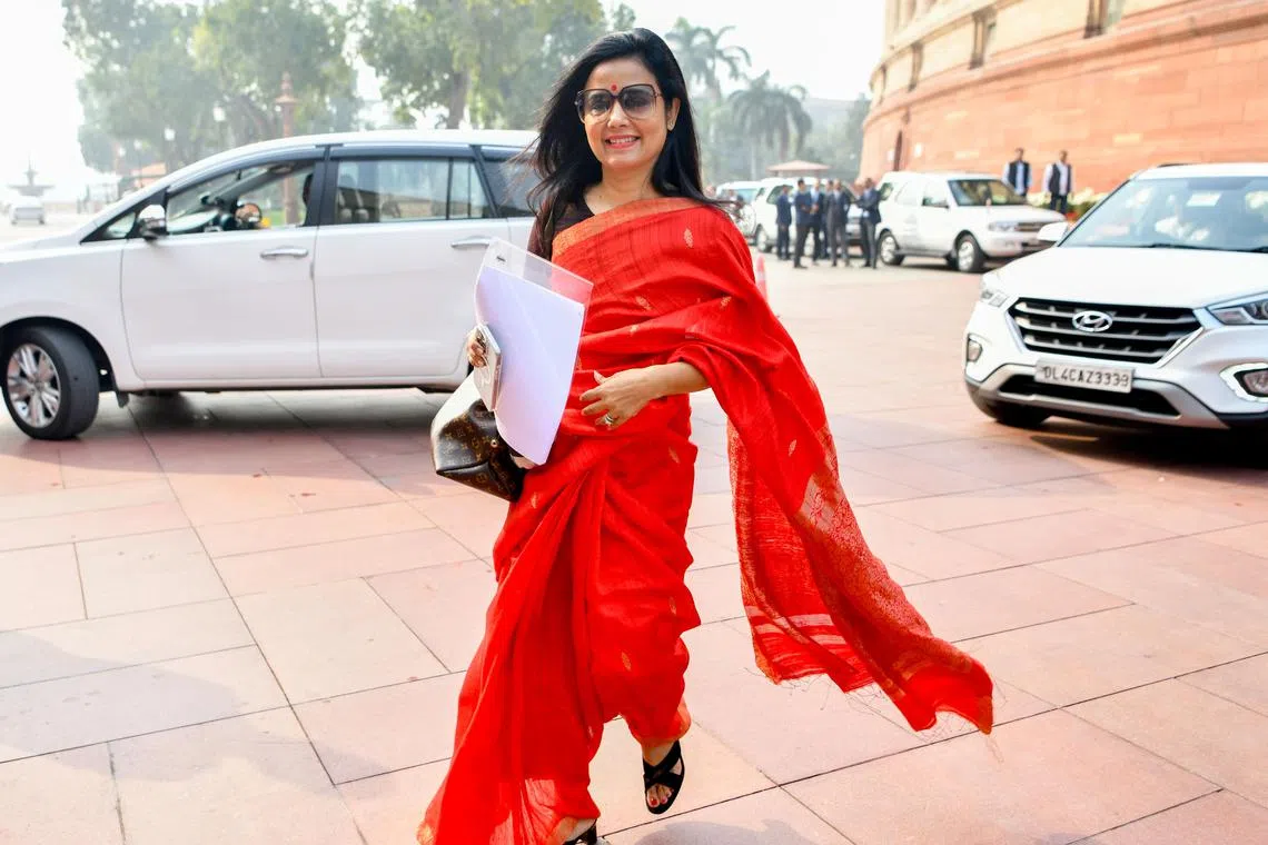 ngmoitra16 - New Delhi, Dec 04 (ANI): Trinamool Congress (TMC) MP Mahua Moitra arrives at Parliament House to attend the first day of Winter Session, in New Delhi on Monday. (ANI Photo/Rahul Singh)No Use India.