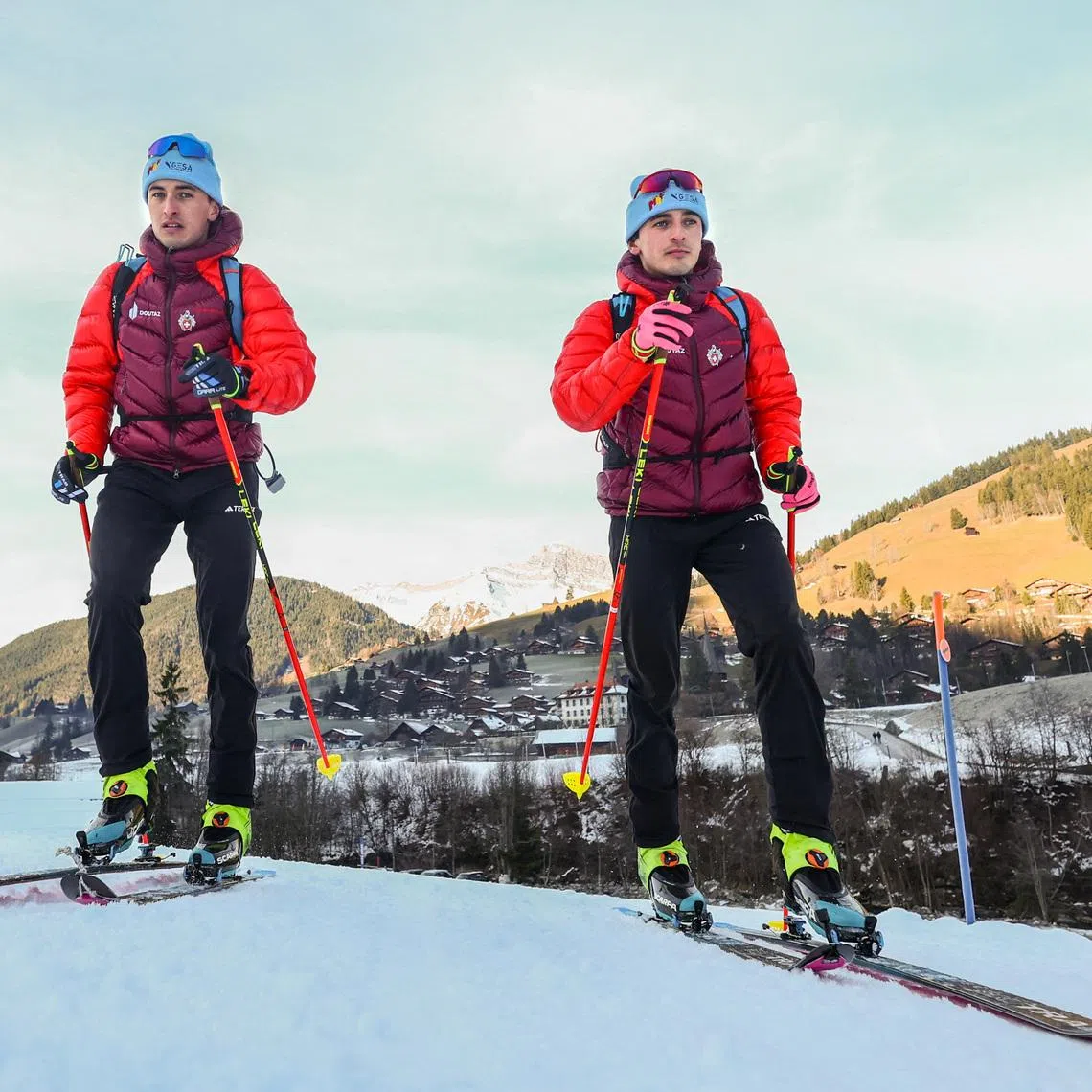 Twin brothers Robin and Thomas Bussard pose after a ski mountaineering training session as they aim to qualify for the 2026 Milano-Cortina Winter Olympics in Bormio, in Rougemont, Switzerland, December 18, 2025. REUTERS/Denis Balibouse