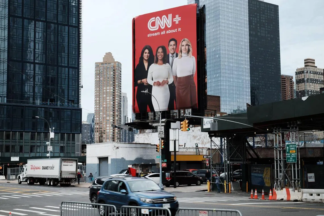 NEW YORK, NEW YORK - APRIL 21: An advertisement for CNN+ is displayed in Manhattan on April 21, 2022 in New York City. Only three weeks after its launch, CNN has announced that it's new streaming service is already planning to shut down. CNN+ had attracted well known names in media and entertainment to its line-up, which looked to compete with other streaming services and to appeal to a younger audience.   Spencer Platt/Getty Images/AFP
== FOR NEWSPAPERS, INTERNET, TELCOS & TELEVISION USE ONLY ==
