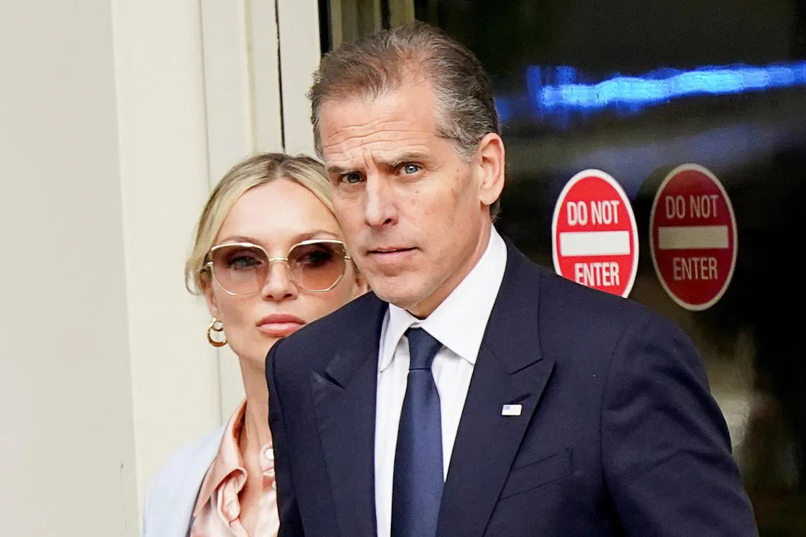 Hunter Biden, son of U.S. President Joe Biden, departs the federal court with his wife Melissa Cohen Biden, on the second day of his trial on criminal gun charges in Wilmington, Delaware, U.S., June 4, 2024. REUTERS/Kevin Lamarque/ File Photo
