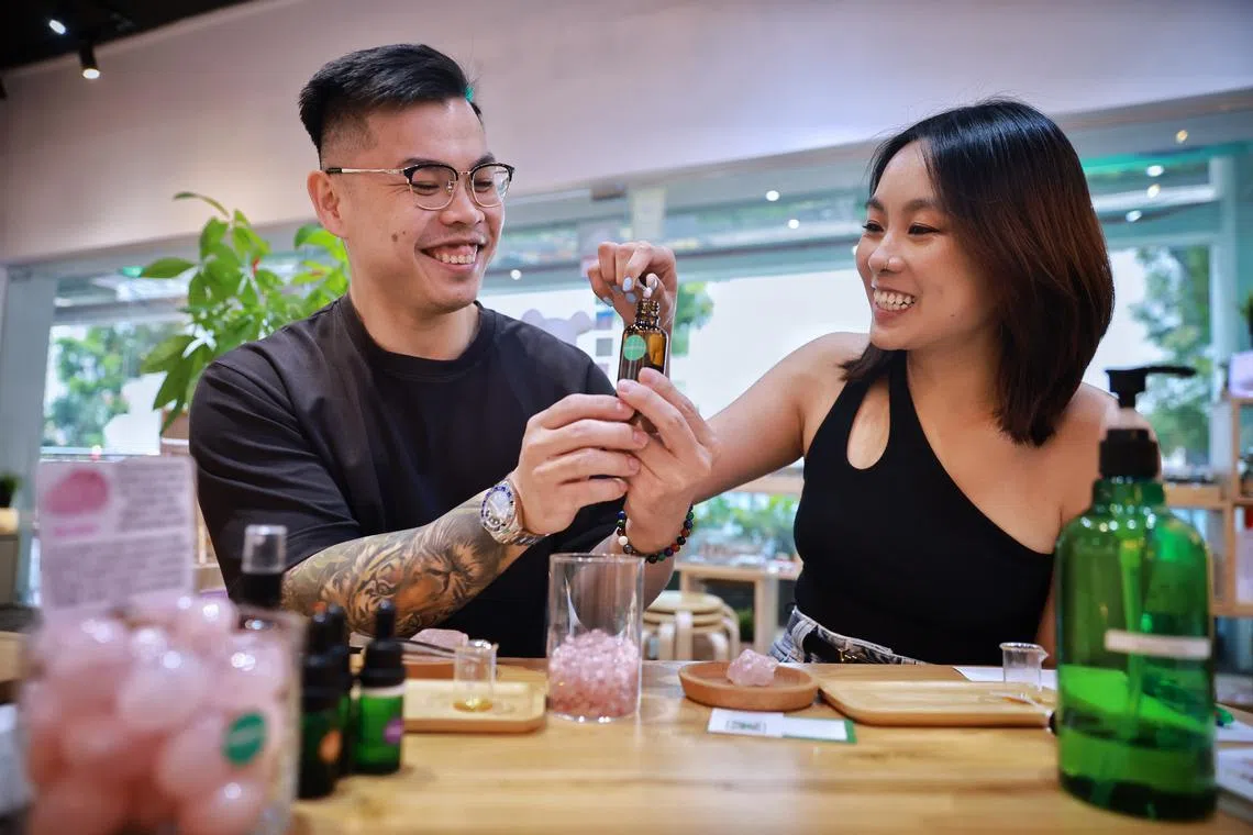 Mr Lai Wei Xiang and his partner Janessa Lee at an aroma gems mist blend workshop conducted by GemStory World.