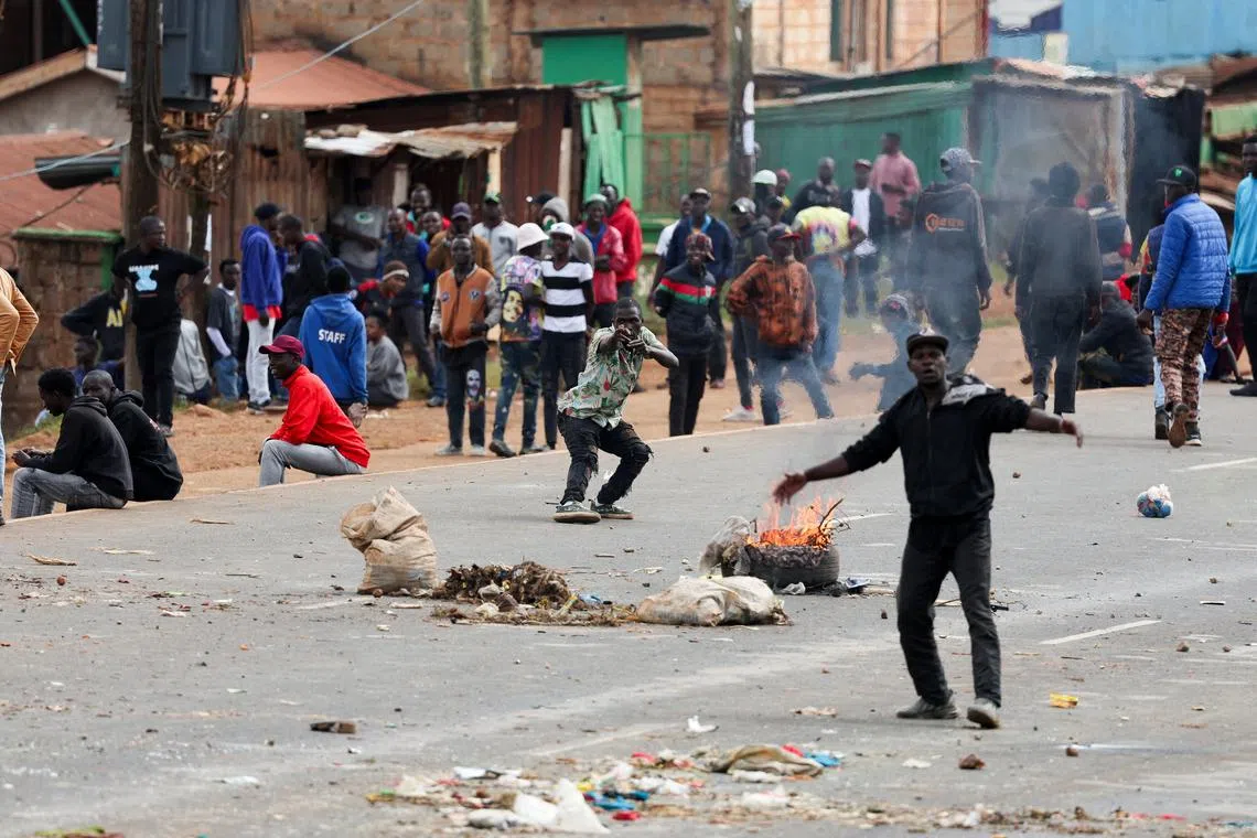 FILE PHOTO: Protesters take part in the \"Saba Saba People's March\" anti-government protest, in Kangemi area of Nairobi, Kenya July 7, 2025. REUTERS/Monicah Mwangi/File Photo