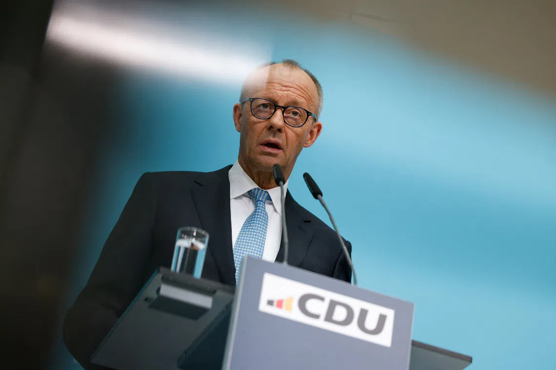 German Chancellor and Christian Democratic Union (CDU) party leader Friedrich Merz speaks to the media following the CDU's Federal Executive Committee meeting in Berlin, Germany, October 12, 2026. REUTERS/Axel Schmidt