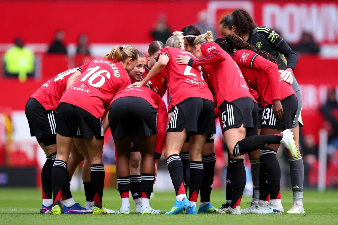 FILE PHOTO: Soccer Football - Women's Super League - Manchester United v Manchester City - Old Trafford, Manchester, Britain - March 28, 2026 Manchester United players huddle before the match Action Images via Reuters/Craig Brough/ File Photo