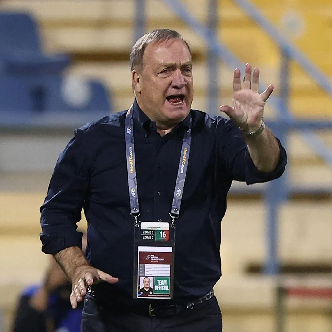 Then Iraq coach Dick Advocaat barking instructions to his players during the 2022 Qatar World Cup Asian qualifier against South Korea in the Qatari capital Doha, on Nov 16, 2021.