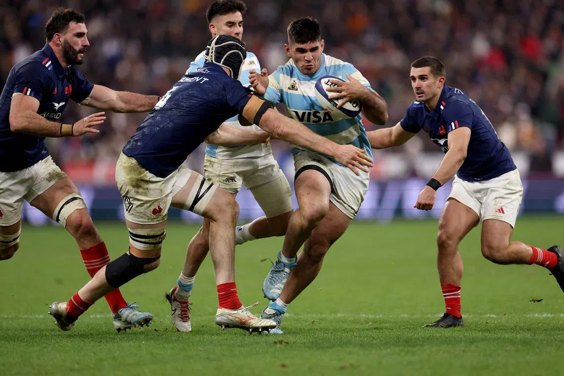 Argentina's No. 8 Joaquin Oviedo is tackled by France's lock Thibaud Flament during the Autumn Nations Series test at the Stade de France.