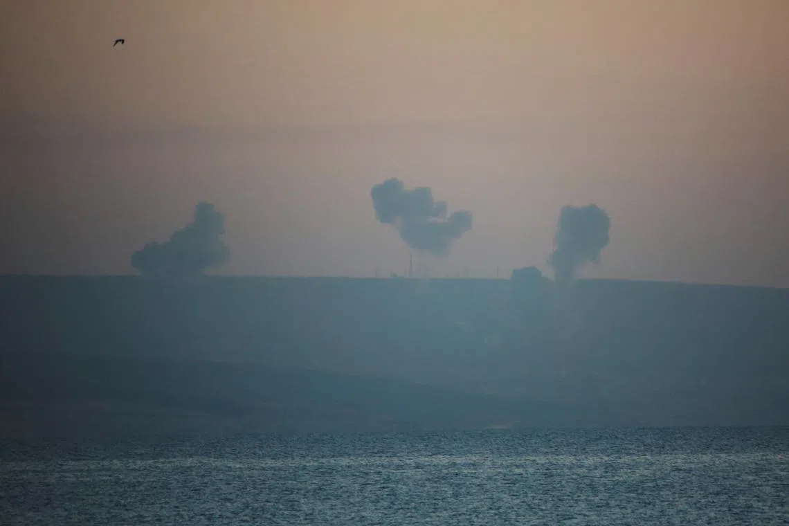FILE PHOTO: Smoke rises on the Lebanese side near the border with Israel, amid ongoing cross-border hostilities between Hezbollah and Israeli forces, as seen from Tyre, southern Lebanon December 2, 2023. REUTERS/Aziz Taher/File Photo