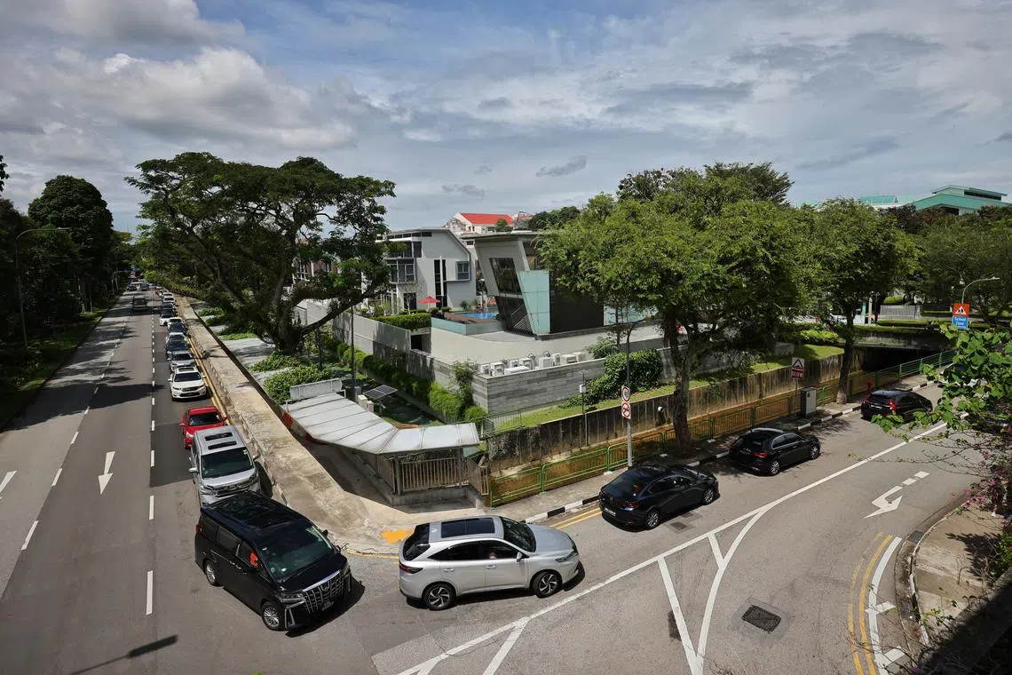 Vehicles lined up along Dunearn Road and turning to Hillcrest Road, outside Raffles Girls’ Primary School, at around 1.30pm on Jan 9.