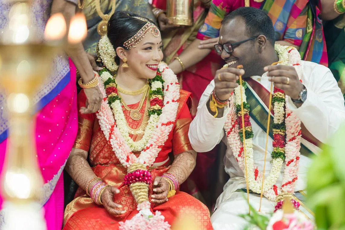 ceremony - The writer and her husband married in a Hindu ceremony at Sri Muneeswaran Temple in Queenstown in November 2018.

Credit: Vanessa Paige Chelvan