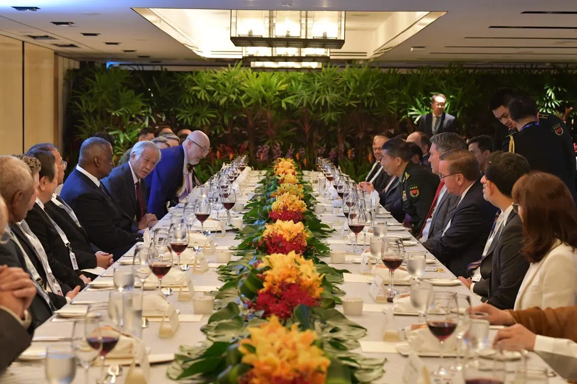 Defence Minister Ng Eng Hen hosting visiting ministers and their representatives to a ministerial roundtable on June 3.