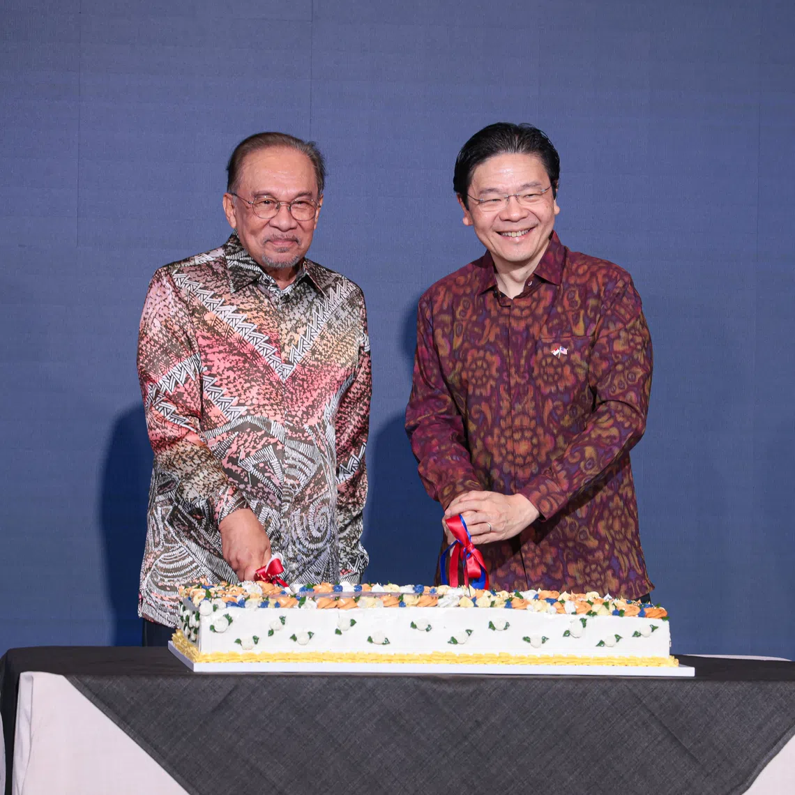 Prime Minister Lawrence Wong and Malaysian Prime Minister Anwar Ibrahim during the 12th Singapore-Malaysia Leaders’ Retreat held at The Ritz-Carlton, Millenia Singapore hotel on Dec 4.