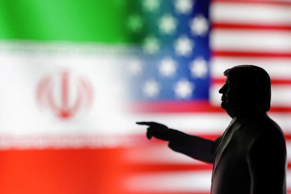 A 3D-printed miniature model depicting U.S. President Donald Trump, Iranian and U.S. flags in this illustration taken,  April 17, 2025. REUTERS/Dado Ruvic/Illustration