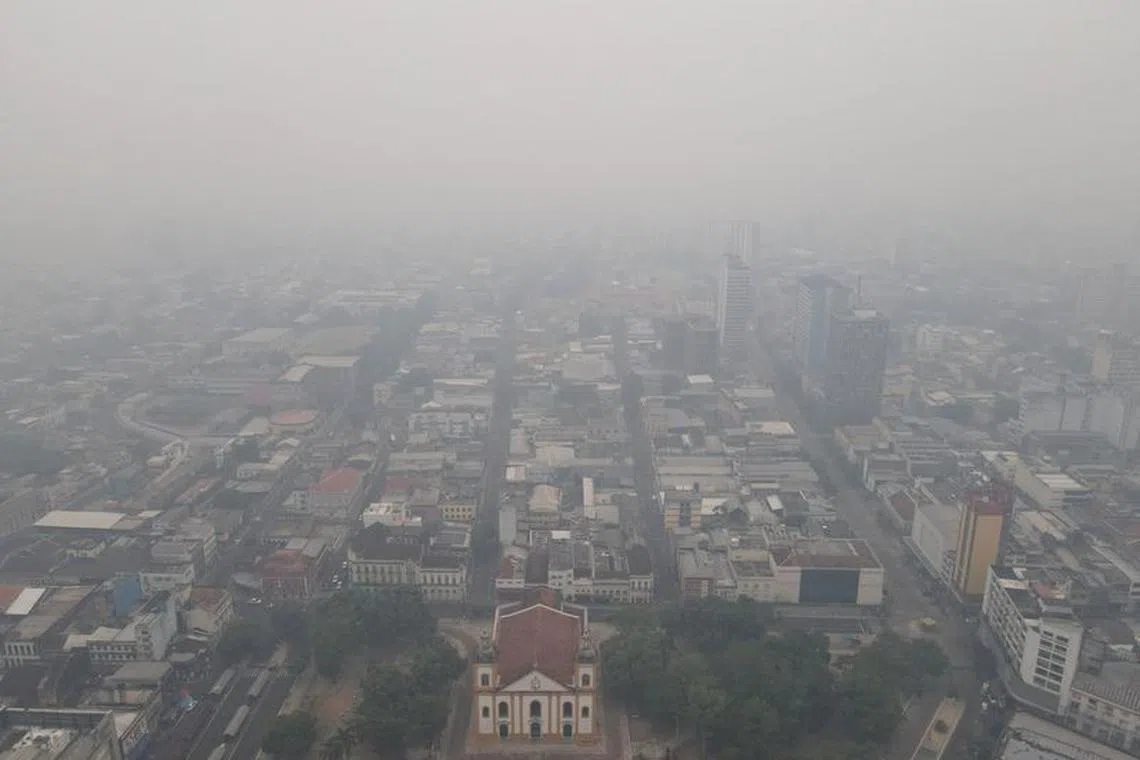 Smoke from wildfires in the Amazon is seen in Manaus, Brazil October 12, 2023. REUTERS/Bruno Kelly