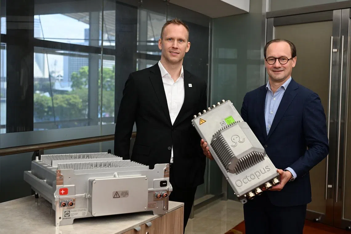 Durapower's head of strategic and business development Douglas Duncan (left) and EST-Floattech chief financial officer Joep Gorgels, with the Octopus Series next generation DNV certified battery systems on April 26, 2023.