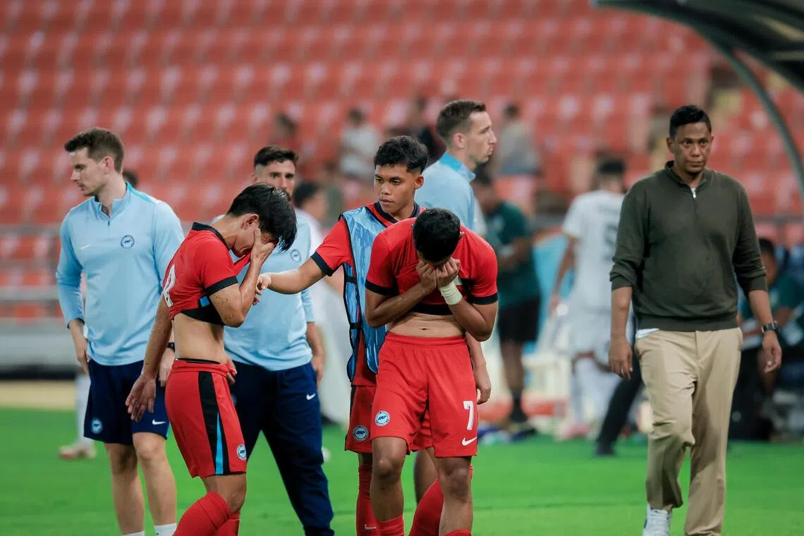 Singapore Men's under-22 football players reacting after the final whistle during the group match at the Rajamangala National Stadium during the Thailand Southeast Asian Games in Bangkok on Dec 6, 2025.